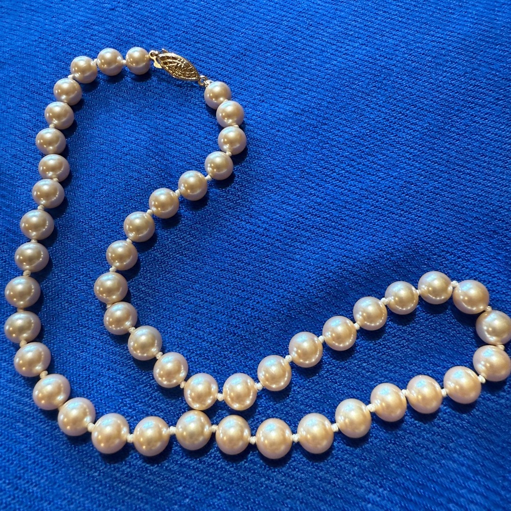 Elegant Pearl Necklace with Gold Tone Filigree Clasp